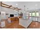 Bright and spacious living room and kitchen featuring an open concept and hardwood floors at 101 River Walk Pkwy, Euharlee, GA 30145