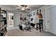 This bonus room with guitars and amps could be converted into a bedroom or home office at 1767 Weatherbrook Cir, Lawrenceville, GA 30043