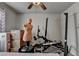 This bedroom is staged as a home gym at 1767 Weatherbrook Cir, Lawrenceville, GA 30043