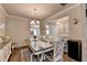 Traditional dining room features hardwood floors and an elegant chandelier at 1767 Weatherbrook Cir, Lawrenceville, GA 30043