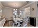 Traditional dining room features hardwood floors and an elegant chandelier at 1767 Weatherbrook Cir, Lawrenceville, GA 30043