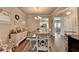 Formal dining room with hardwood floors, chandelier, and seating for eight at 1767 Weatherbrook Cir, Lawrenceville, GA 30043