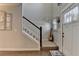 Inviting foyer with hardwood floors, a staircase, and neutral paint at 1767 Weatherbrook Cir, Lawrenceville, GA 30043