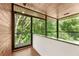 Wood-paneled balcony with mature tree and greenery views at 2105 Fairhaven Ne Cir, Atlanta, GA 30305