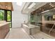 Modern bathroom with a glass shower, soaking tub, and sleek countertops at 2105 Fairhaven Ne Cir, Atlanta, GA 30305