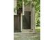 Close-up of a modern gate and entrance to a stylish home with clean lines at 2105 Fairhaven Ne Cir, Atlanta, GA 30305