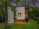 Stunning modern home boasting large windows and a unique design, nestled amongst mature trees at 2105 Fairhaven Ne Cir, Atlanta, GA 30305