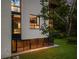 Modern home featuring expansive windows, lush landscaping, and a distinctive architectural design at 2105 Fairhaven Ne Cir, Atlanta, GA 30305