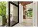 Contemporary foyer with natural lighting and open floor plan into the living area at 2105 Fairhaven Ne Cir, Atlanta, GA 30305