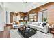 Cozy living room showcasing stylish furniture and an open layout leading to the kitchen at 2105 Fairhaven Ne Cir, Atlanta, GA 30305