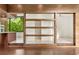 Open living space with wooden design and connecting hallways with bright natural lighting at 2105 Fairhaven Ne Cir, Atlanta, GA 30305