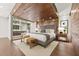 Luxurious main bedroom with wood accents, ensuite bathroom, and a spacious walk-in closet at 2105 Fairhaven Ne Cir, Atlanta, GA 30305