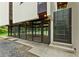 Lovely screened porch with dark beams and access gate to the side of the house at 2105 Fairhaven Ne Cir, Atlanta, GA 30305