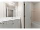 Bathroom features a white vanity with a white sink, a mirror, and a separate water closet at 2345 Gallard St, Lawrenceville, GA 30043