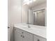 Bathroom featuring a white vanity with a white sink and a mirror at 2345 Gallard St, Lawrenceville, GA 30043