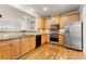Well-equipped kitchen with stainless steel appliances, granite countertops, and ample cabinetry at 2345 Gallard St, Lawrenceville, GA 30043