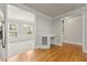 Bright office nook featuring custom wine rack and hardwood floors at 2345 Gallard St, Lawrenceville, GA 30043
