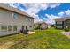 Backyard offering ample green space, patio, and grill at 2486 Bear Mountain St, Lithonia, GA 30058