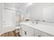 Stylish bathroom with white vanity, sleek fixtures, and a shower-tub combo at 6710 Pippin Walk, Alpharetta, GA 30005
