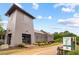 Halcyon's amenity center with gray siding and a black metal roof is next to a walking path at 6710 Pippin Walk, Alpharetta, GA 30005