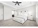 Large main bedroom features a tray ceiling, neutral palette, and bright natural light at 6710 Pippin Walk, Alpharetta, GA 30005