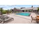 Inviting community pool with lounge chairs and ample seating for residents at 6710 Pippin Walk, Alpharetta, GA 30005