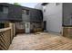 View of the back deck with brick and siding house in the background at 149 Rondak Se Cir, Smyrna, GA 30080