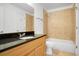 Well-appointed bathroom with granite counter, tile shower, and tub combination at 149 Rondak Se Cir, Smyrna, GA 30080