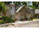 Charming townhome with brick facade, inviting entrance, and well-maintained landscaping at 149 Rondak Se Cir, Smyrna, GA 30080