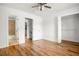 Large main bedroom, showcasing pristine white walls, new floors, and easy access to an ensuite bathroom and walk-in closet at 149 Rondak Se Cir, Smyrna, GA 30080