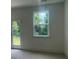 Bedroom with a door to the outdoors and a large window at 1615 Gunnin Nw Trce, Atlanta, GA 30318