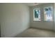 Bright bedroom with natural light streaming through two large windows at 1615 Gunnin Nw Trce, Atlanta, GA 30318