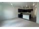 Bright kitchen features granite countertops, stainless appliances, and opens to a large living area at 1615 Gunnin Nw Trce, Atlanta, GA 30318