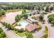 Beautiful community pool and lake with tennis courts surrounded by lush greenery and well-maintained landscaping at 5600 Buck Hollow Dr, Alpharetta, GA 30005