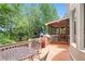Large outdoor back deck, perfect for entertaining guests and enjoying the serene wooded views at 5600 Buck Hollow Dr, Alpharetta, GA 30005