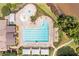Overhead view of a sparkling community pool featuring swimming lanes, lounge areas, and a splash pad for  at 5600 Buck Hollow Dr, Alpharetta, GA 30005