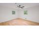 Bright bedroom with hardwood floors, ceiling fan, and natural light at 119 Walker Nw Rd, Cartersville, GA 30121