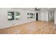 Hardwood floors, white walls, and neutral ceiling fan in open floor plan living room at 119 Walker Nw Rd, Cartersville, GA 30121