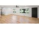 Bright living room with beautiful hardwood floors, fresh white walls, and natural light at 119 Walker Nw Rd, Cartersville, GA 30121