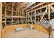 Large unfinished attic with exposed beams and ductwork, providing ample storage space at 328 Shade Tree Cir, Woodstock, GA 30188