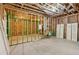 Unfinished basement is framed and ready for customization, offering ample potential space at 328 Shade Tree Cir, Woodstock, GA 30188