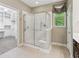Bathroom featuring frameless glass shower at 328 Shade Tree Cir, Woodstock, GA 30188