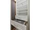 Custom closet storage with drawers, shelves, and pull-out organizers at 328 Shade Tree Cir, Woodstock, GA 30188
