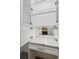 Vanity area in closet with marble countertops and ample storage at 328 Shade Tree Cir, Woodstock, GA 30188