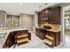 Kitchen with granite countertops and convenient pull-out drawers next to gas stove at 328 Shade Tree Cir, Woodstock, GA 30188