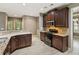 Kitchen has granite countertops, stainless steel microwave and gas stove at 328 Shade Tree Cir, Woodstock, GA 30188