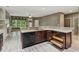 Open concept kitchen features granite countertops and convenient pull-out drawers at 328 Shade Tree Cir, Woodstock, GA 30188