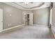 Spacious main bedroom includes trey ceilings and ensuite bathroom at 328 Shade Tree Cir, Woodstock, GA 30188