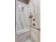 Elegant marble shower with rainfall showerhead and built-in bench at 328 Shade Tree Cir, Woodstock, GA 30188