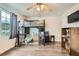 Bedroom boasts a loft bed and desk combination and wood-look flooring at 4023 Stillwater Dr, Duluth, GA 30096